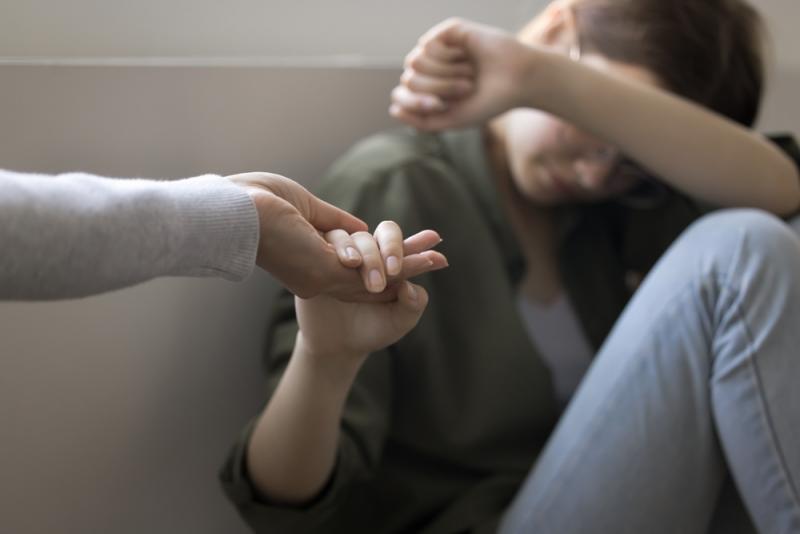 Young person crying