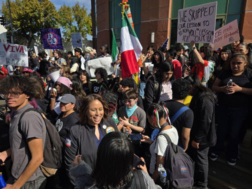 Senator Menjivar meeting students at the Student Valley Walkout